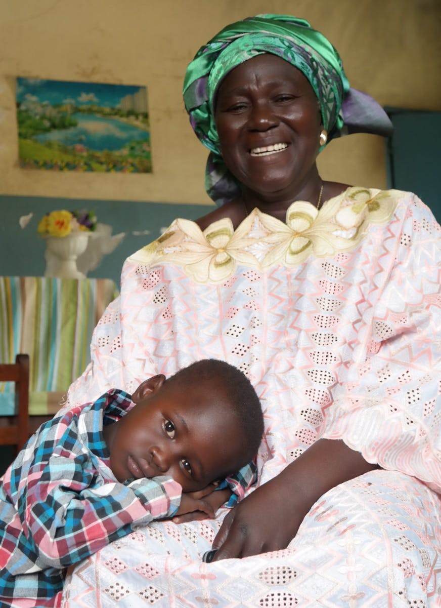 Tsjaad Kinderdorp N'Djamena moeder Claudette met zoon
